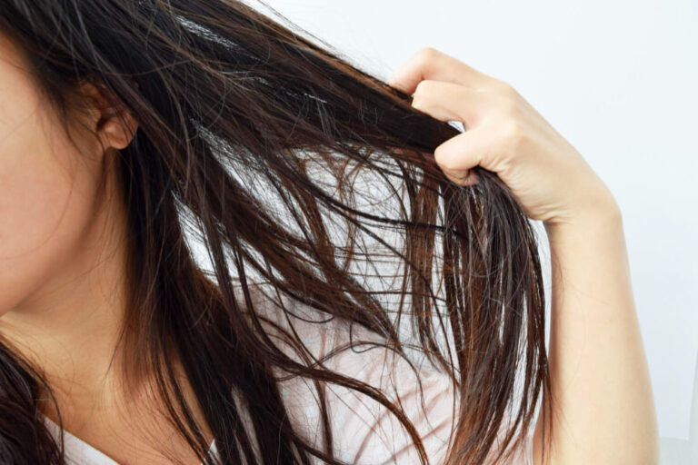 What's Causing Your Oily Hair (And How to Fix It)